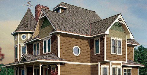 CEDAR IMPRESSIONS Double 7″ Straight Edge Perfection Shingles shown on a home